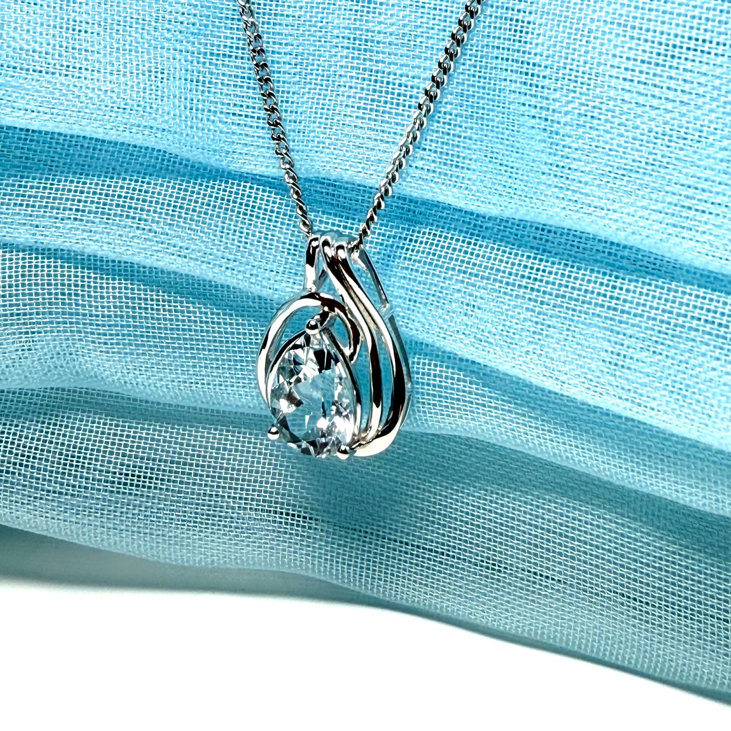 Real aquamarine white gold necklace swirl designed pear shaped stone