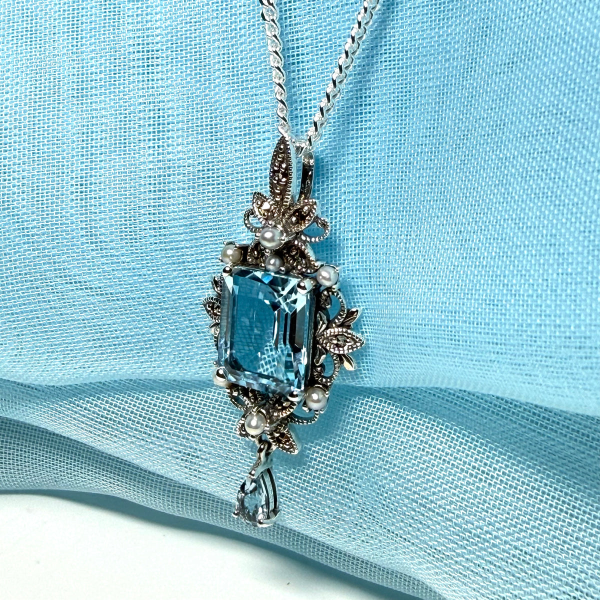 Real blue topaz and real freshwater pearl necklace pendant with real marcasite stones