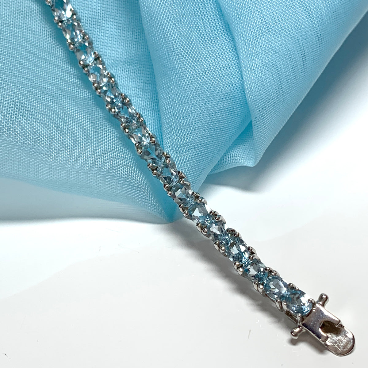 Real blue topaz bracelet oval sterling silver