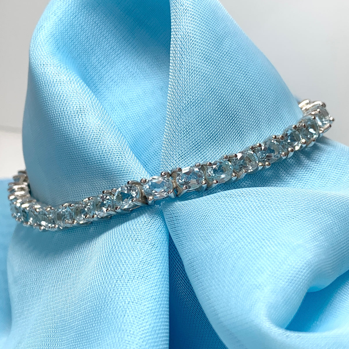 Real blue topaz bracelet oval sterling silver