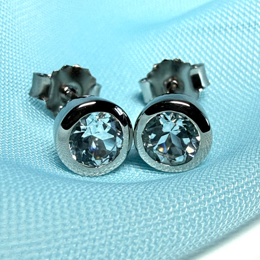 Real blue topaz round stud earrings smooth rubbed over edges