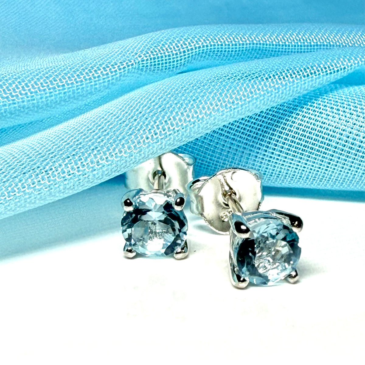 Real blue topaz round stud earrings sterling silver claw setting