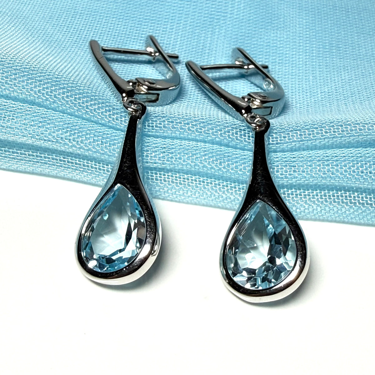 Real blue topaz sterling silver dropped earrings pear shaped stones