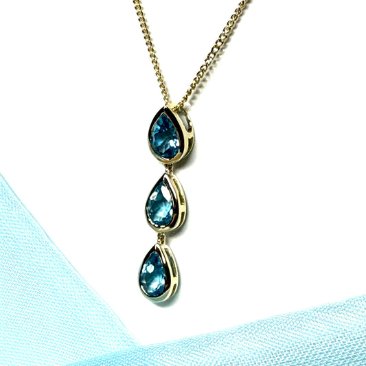 Real blue topaz triple necklace pear shaped yellow gold teardrop pendant