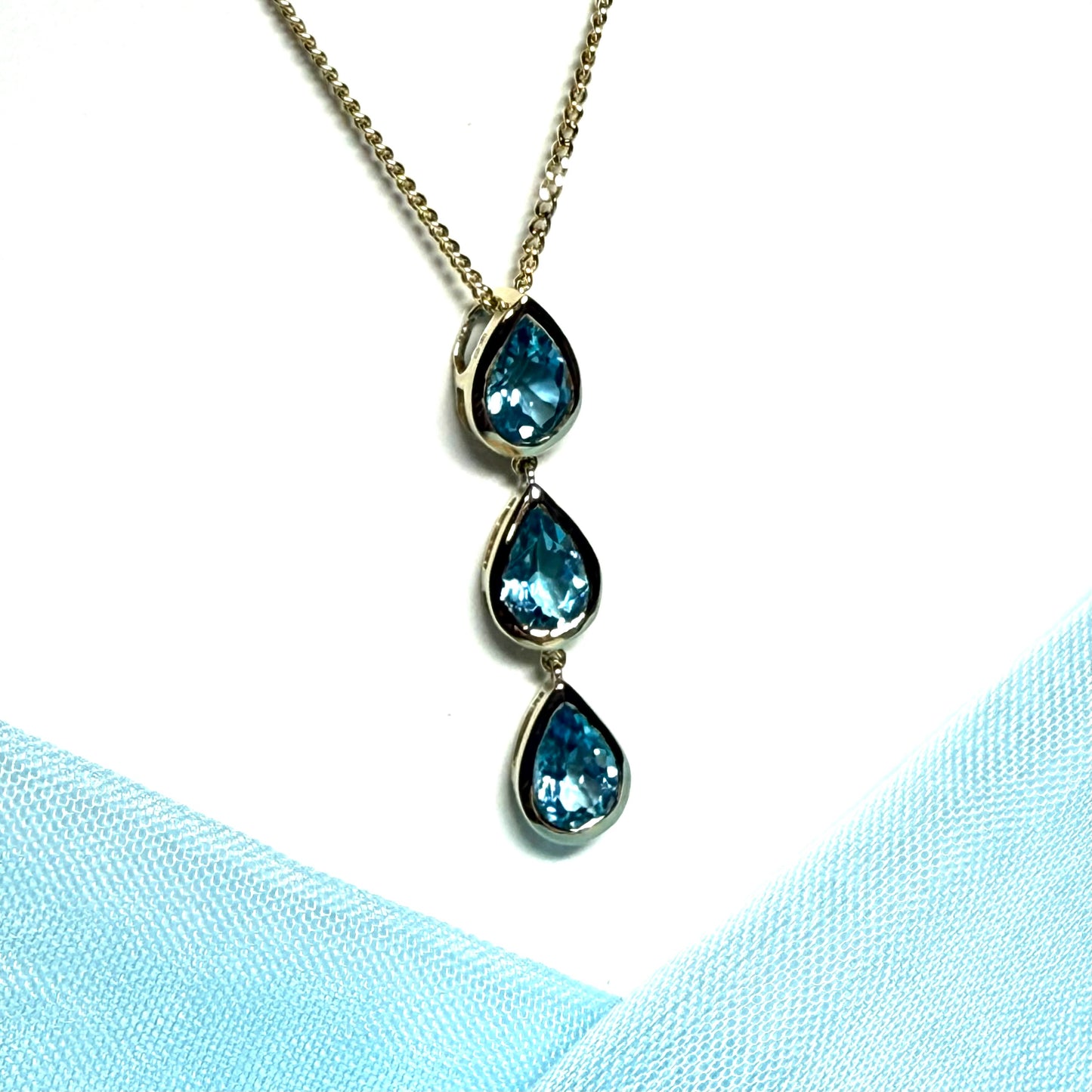 Real blue topaz triple necklace pear shaped yellow gold teardrop pendant