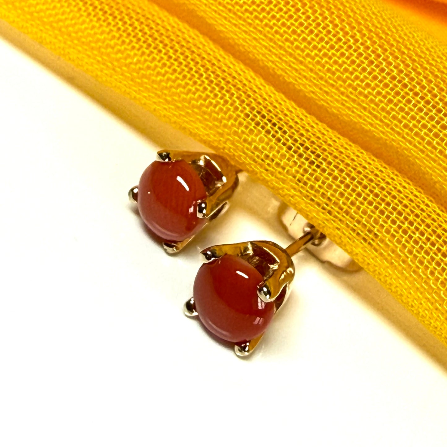 Real coral yellow gold round clawed set stud earrings