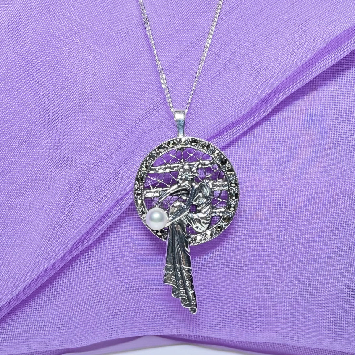Real cultured freshwater pearl and real marcasite sterling silver necklace lady sitting
