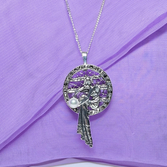 Real cultured freshwater pearl and real marcasite sterling silver necklace lady sitting