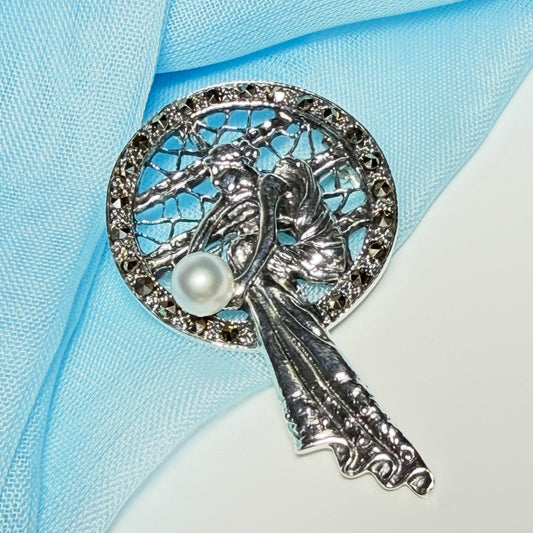 Real cultured freshwater pearl and real Real cultured freshwater pearl and real marcasite sterling silver brooch lady sitting