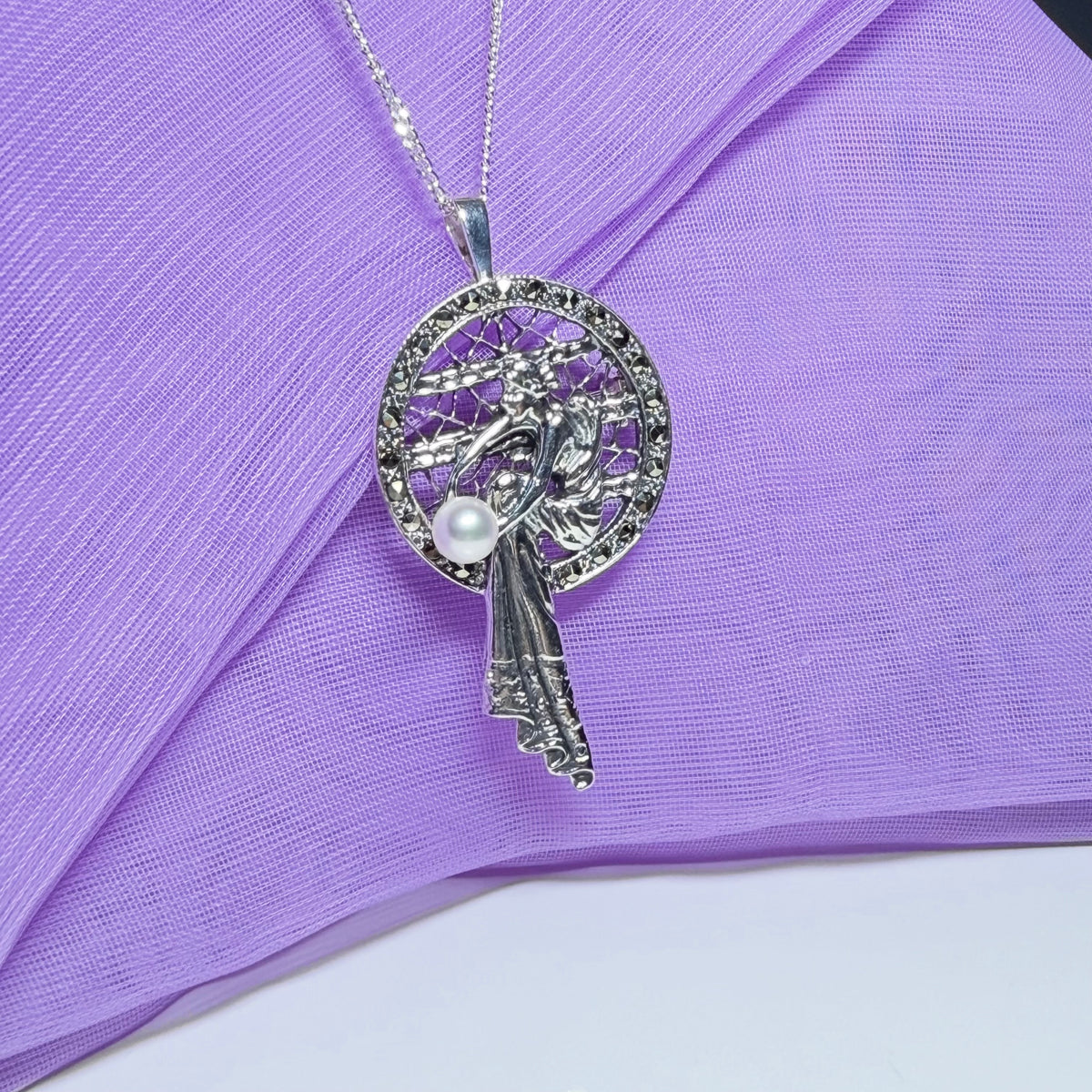 Real cultured freshwater pearl and real marcasite sterling silver necklace lady sitting