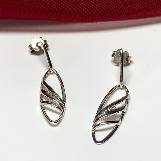 Real diamond drop earrings white gold oval shaped pierced