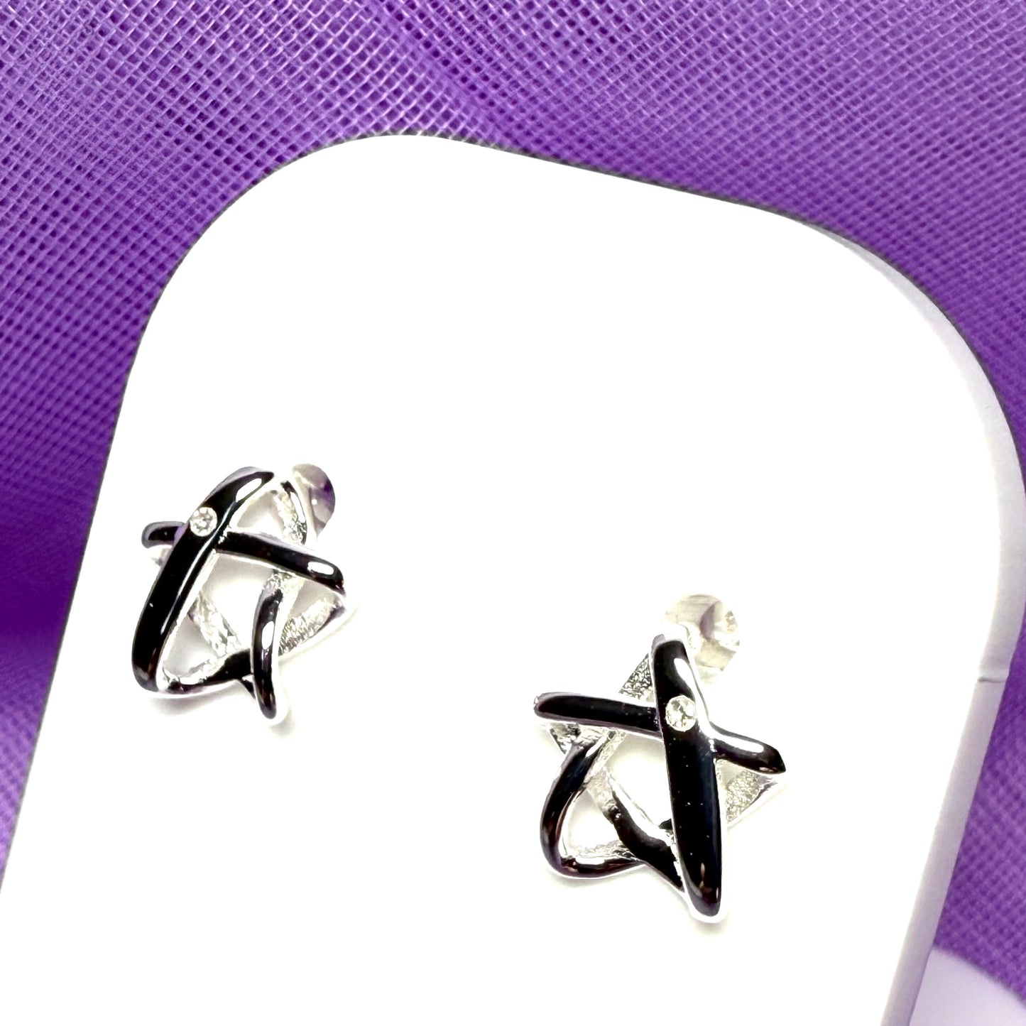 Real diamond set star shaped open stud earrings sterling silver