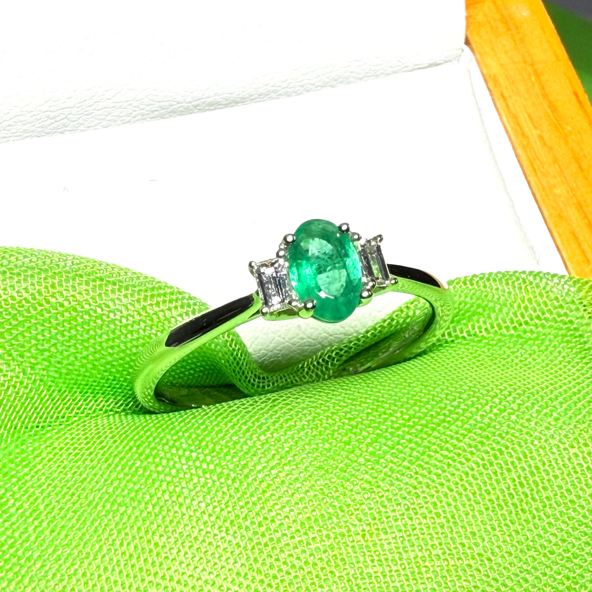 Real emerald and diamond three stone trilogy ring white gold