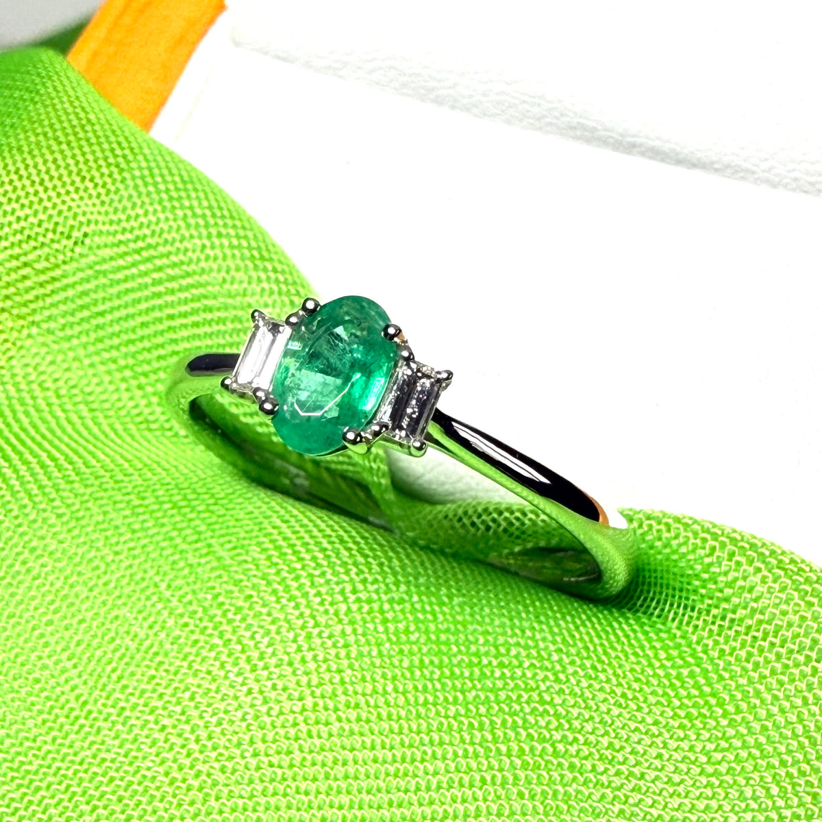 Real emerald and diamond three stone trilogy ring white gold