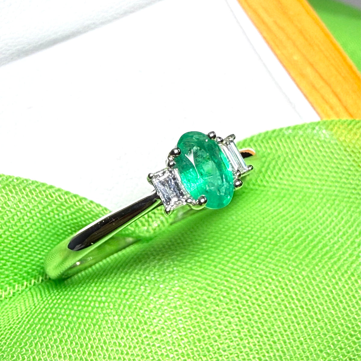 Real emerald and diamond three stone trilogy ring white gold