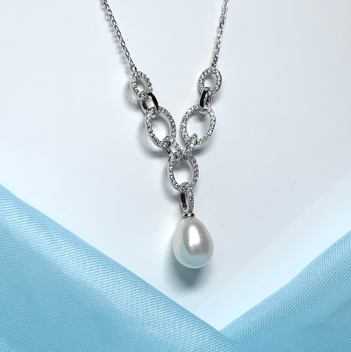 Real freshwater cultured pearl necklace chain links cubic zirconia stones above the pendant