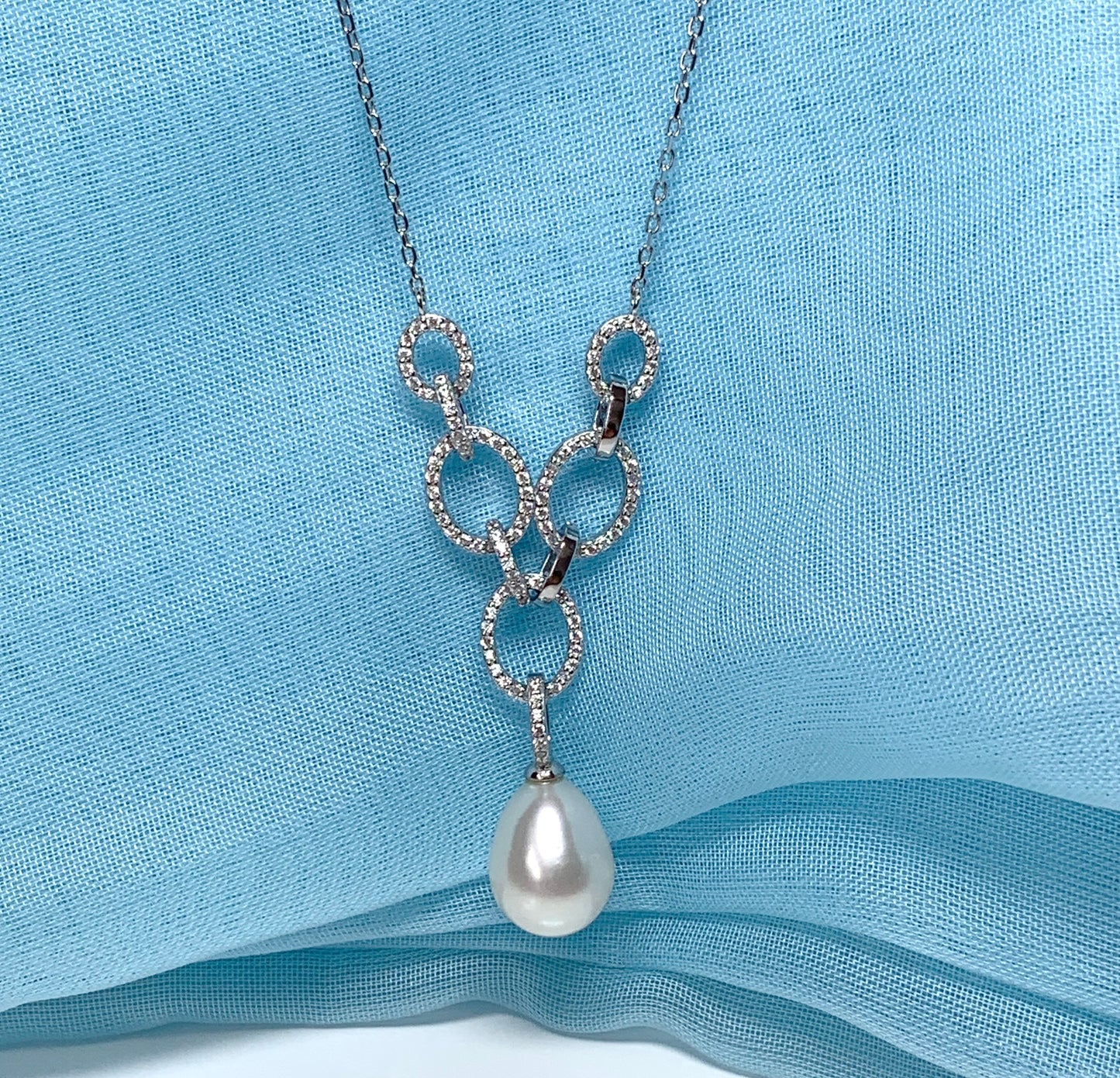 Real freshwater cultured pearl necklace chain links cubic zirconia stones above the pendant
