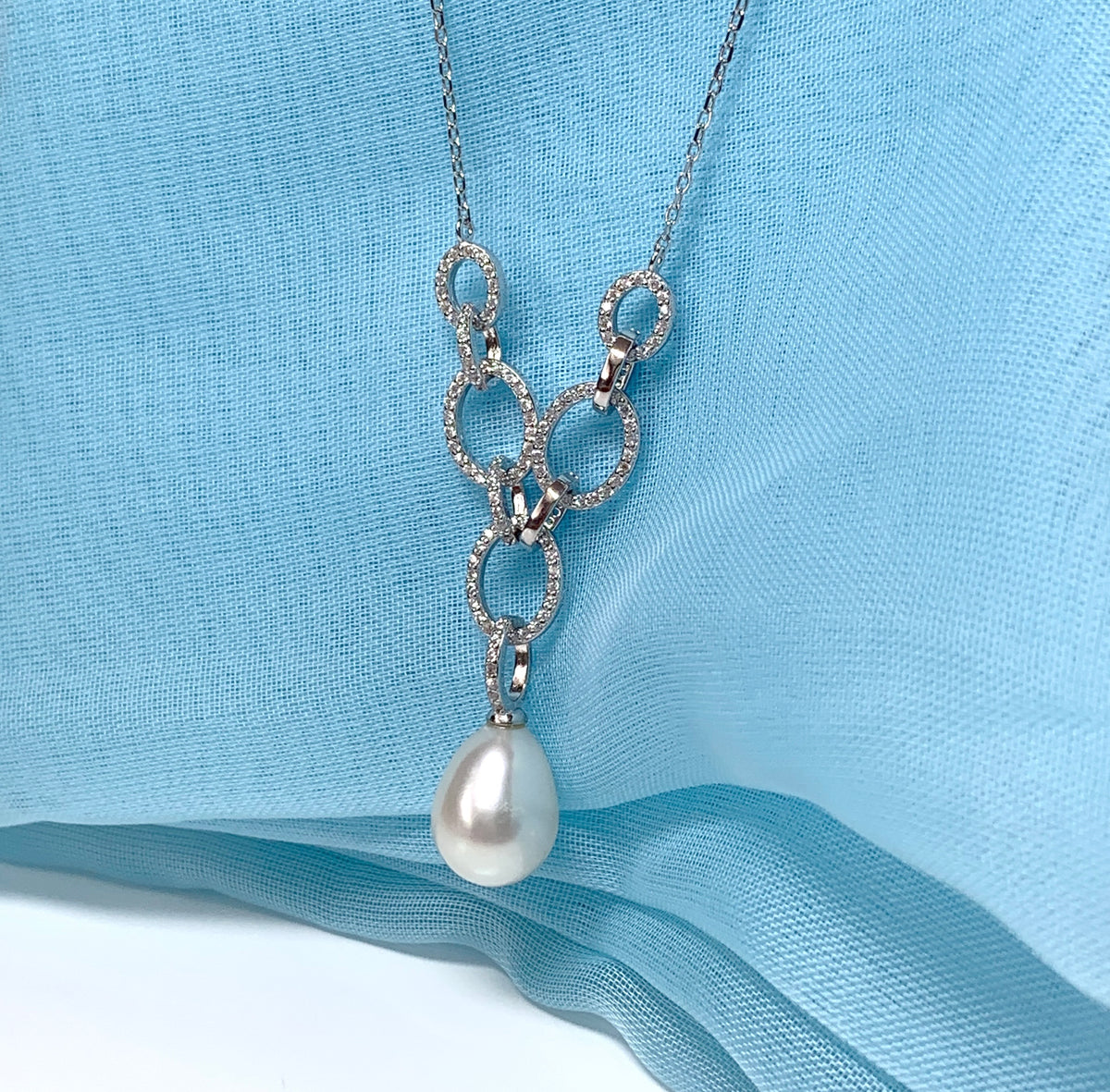 Real freshwater cultured pearl necklace chain links cubic zirconia stones above the pendant