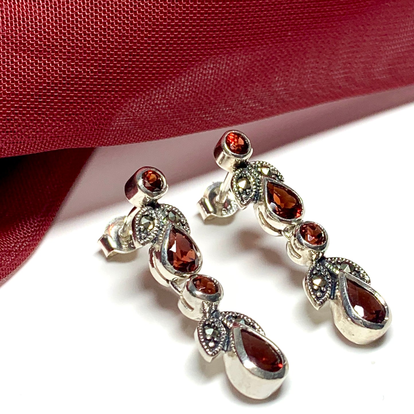 Real garnet drop earrings and real marcasite crafted in sterling silver