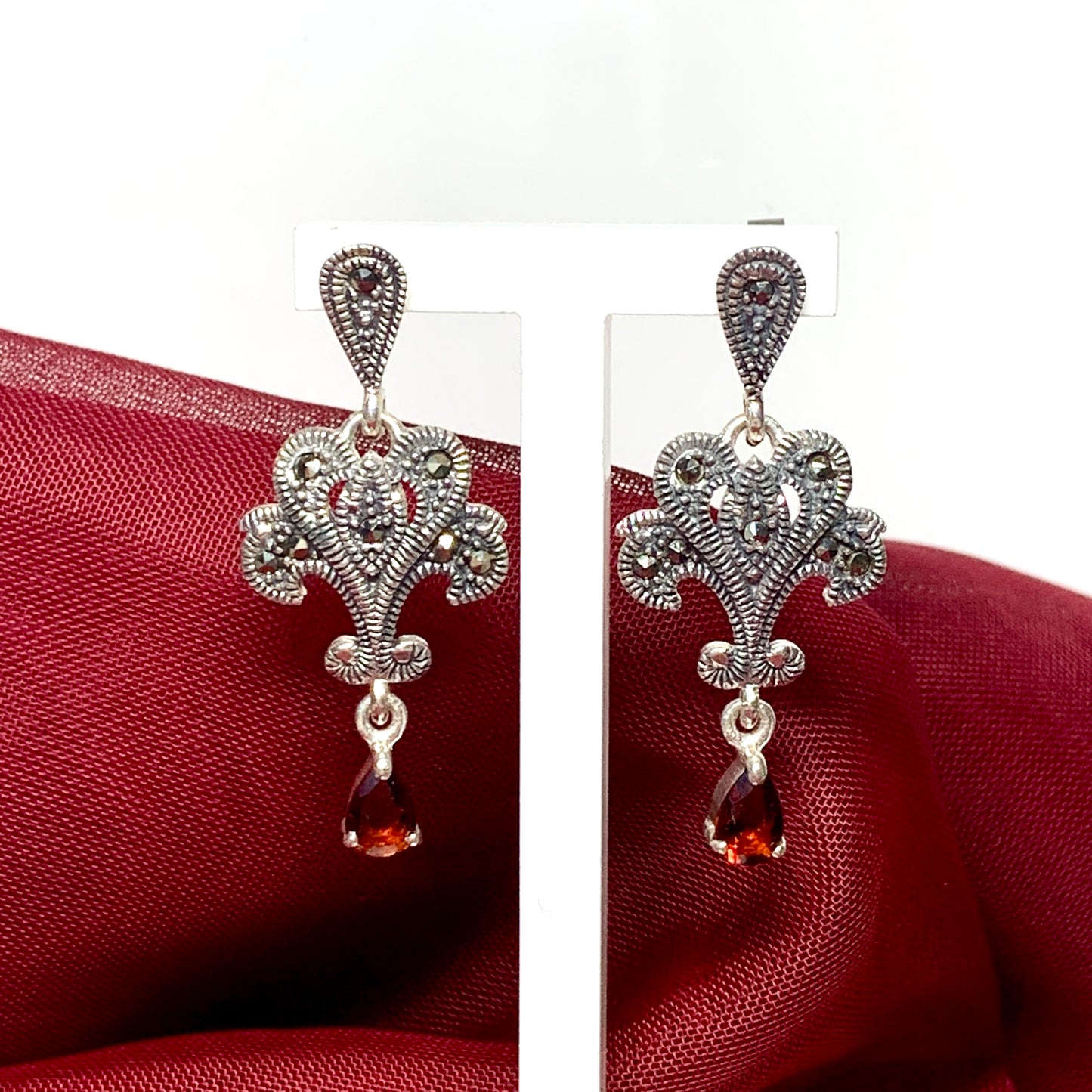 Real garnet fancy drop earrings and real marcasite crafted in sterling silver