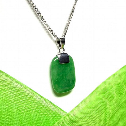 Real green jade necklace having a cushion shaped stone sterling silver with a chain included