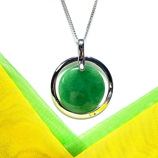 Real green jade necklace in a large round shape with a beautiful designed halo pendant with a chain