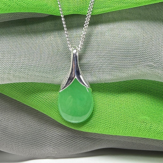 Real green jade necklace in a teardrop or pear shaped, timeless designed pendant with chain
