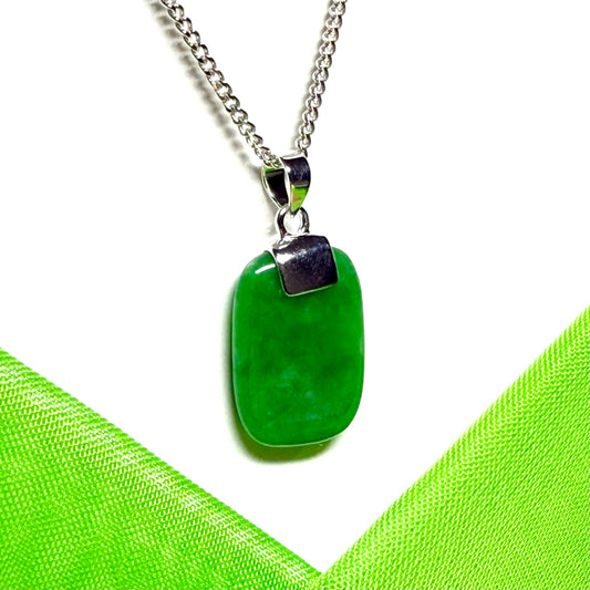 Real green jade necklace with a cushion shaped stone sterling silver with a chain included