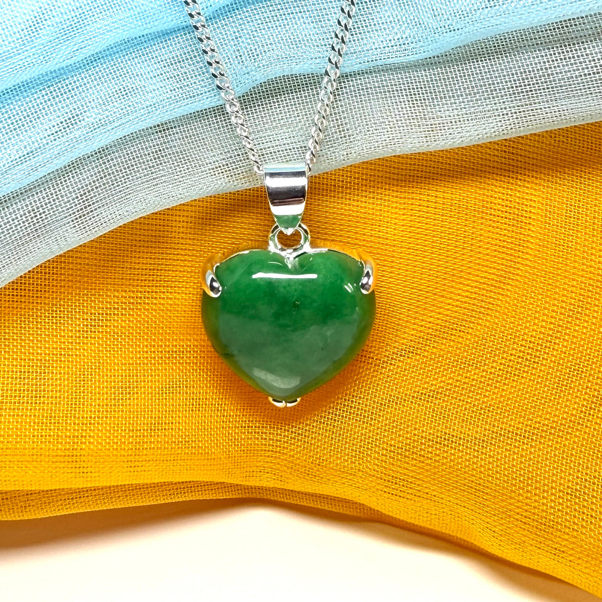 A real green jade pendant heart shaped sterling silver, a gorgeous design necklace with chain