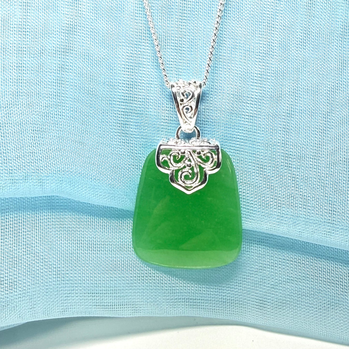 Real green jade stone, large cushion shaped pendant with solid chain and box included as well