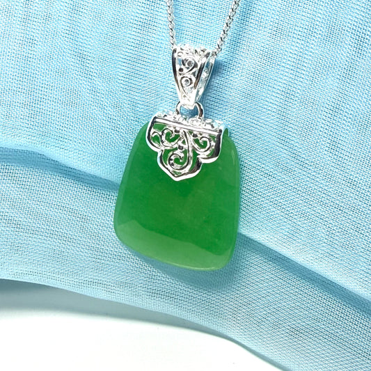 Real green jade stone, large cushion shaped pendant with solid chain and box included as well