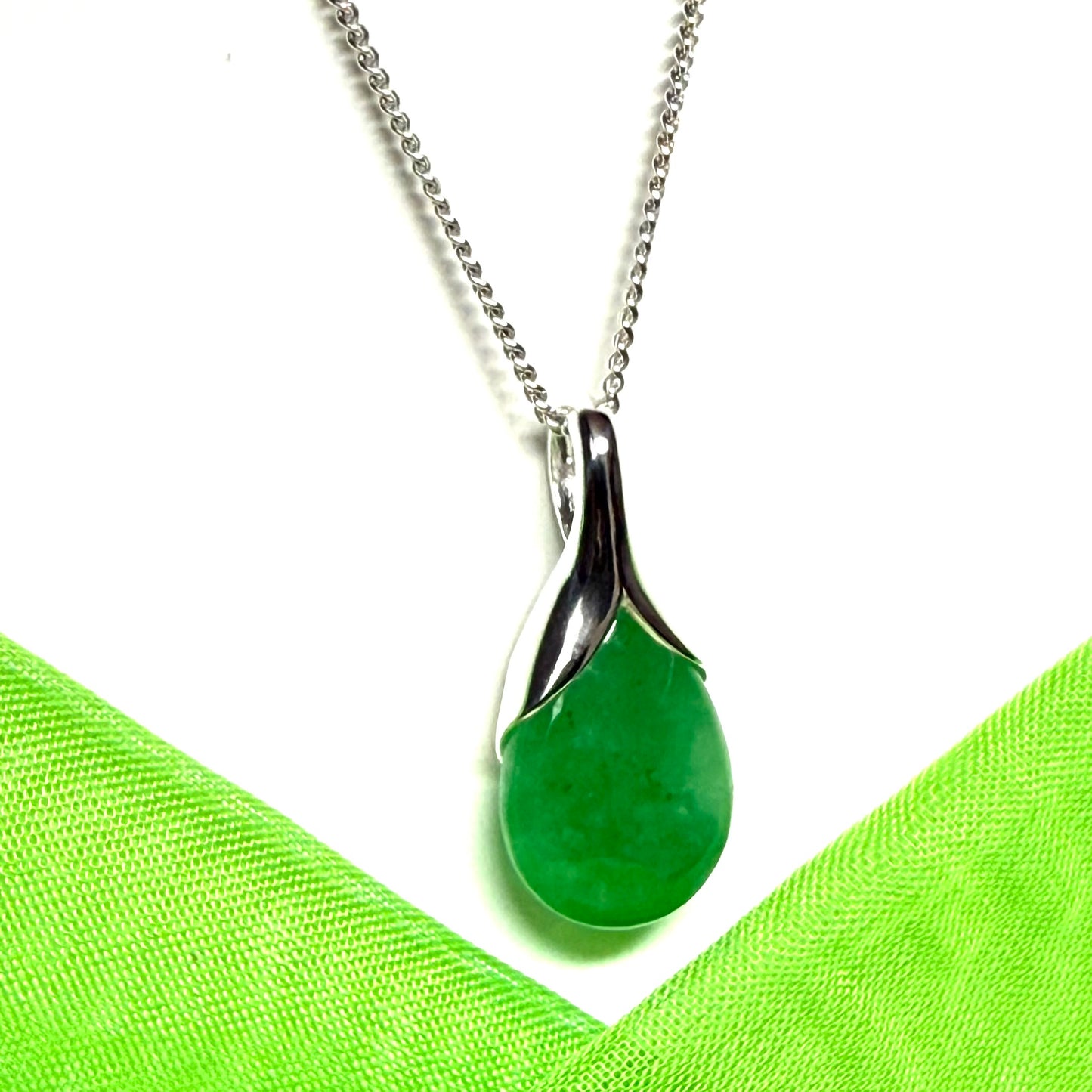 Real green jade tear drop sterling silver pear or teardrop shape pendant to it