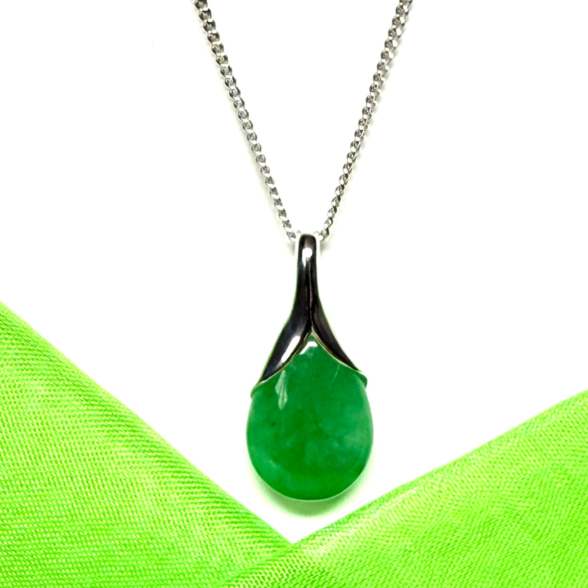 Real green jade tear drop sterling silver pear or teardrop shape pendant to it