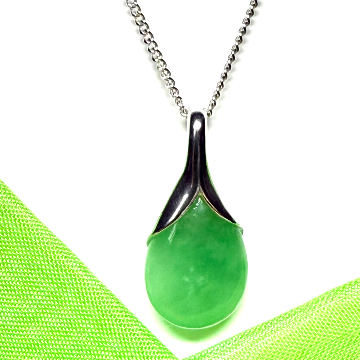 Real green jade tear drop sterling silver pear or teardrop shape pendant to it
