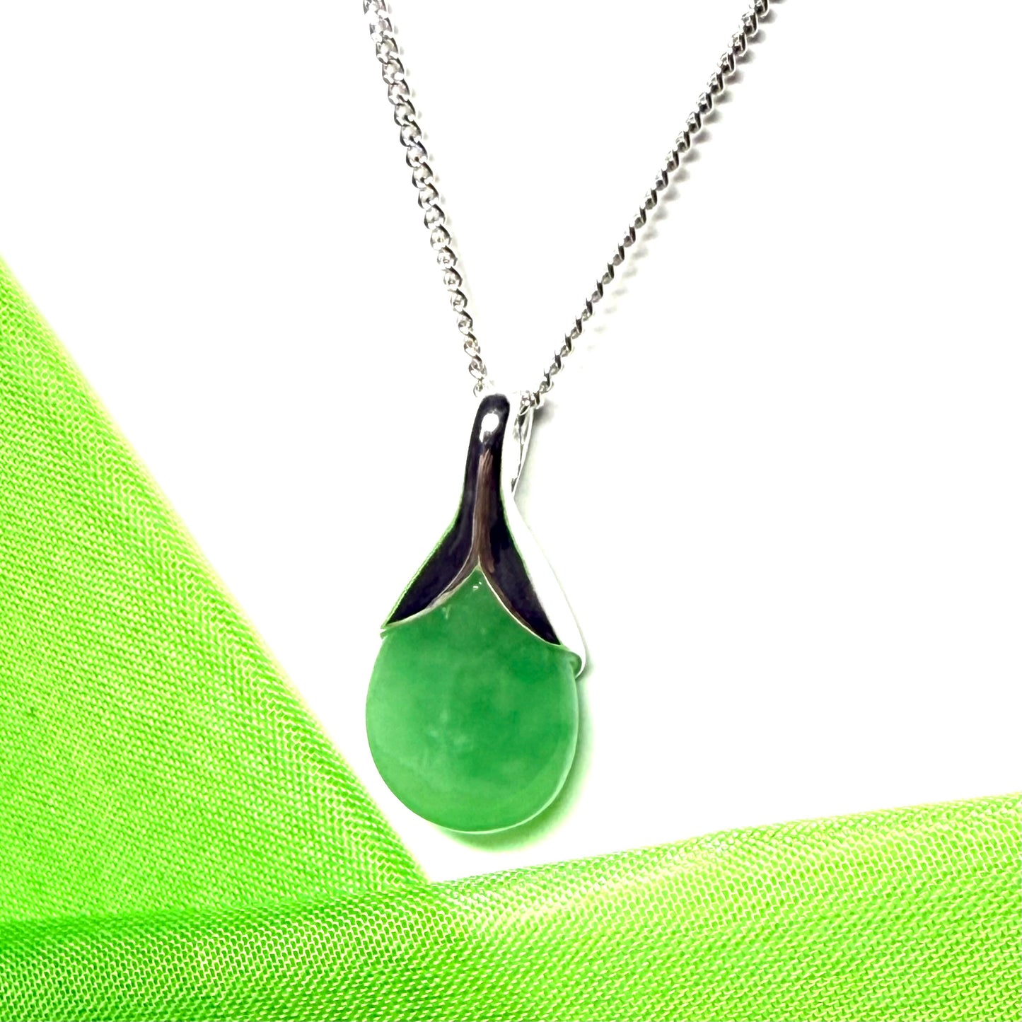 Real green jade tear drop sterling silver pear or teardrop shape pendant to it