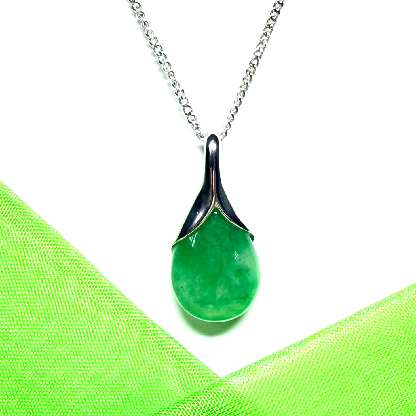Real green jade teardrop sterling silver with a pear shaped pendant