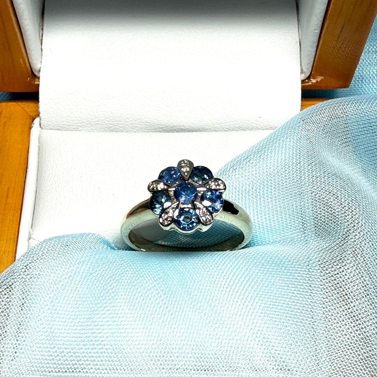 Real light blue sapphire and real diamond round cluster ring yellow gold