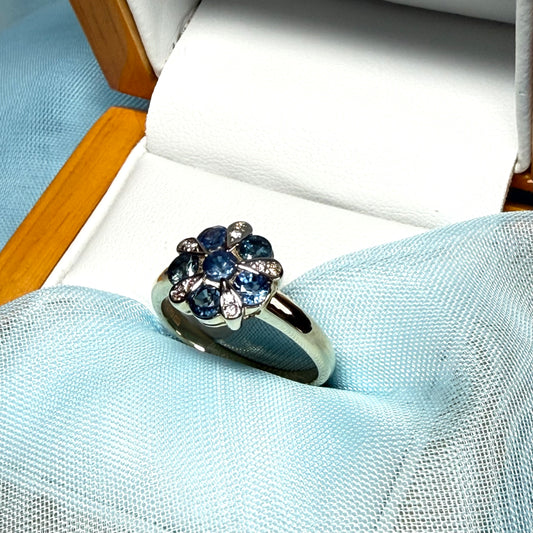 Real light blue sapphire and real diamond round cluster ring yellow gold