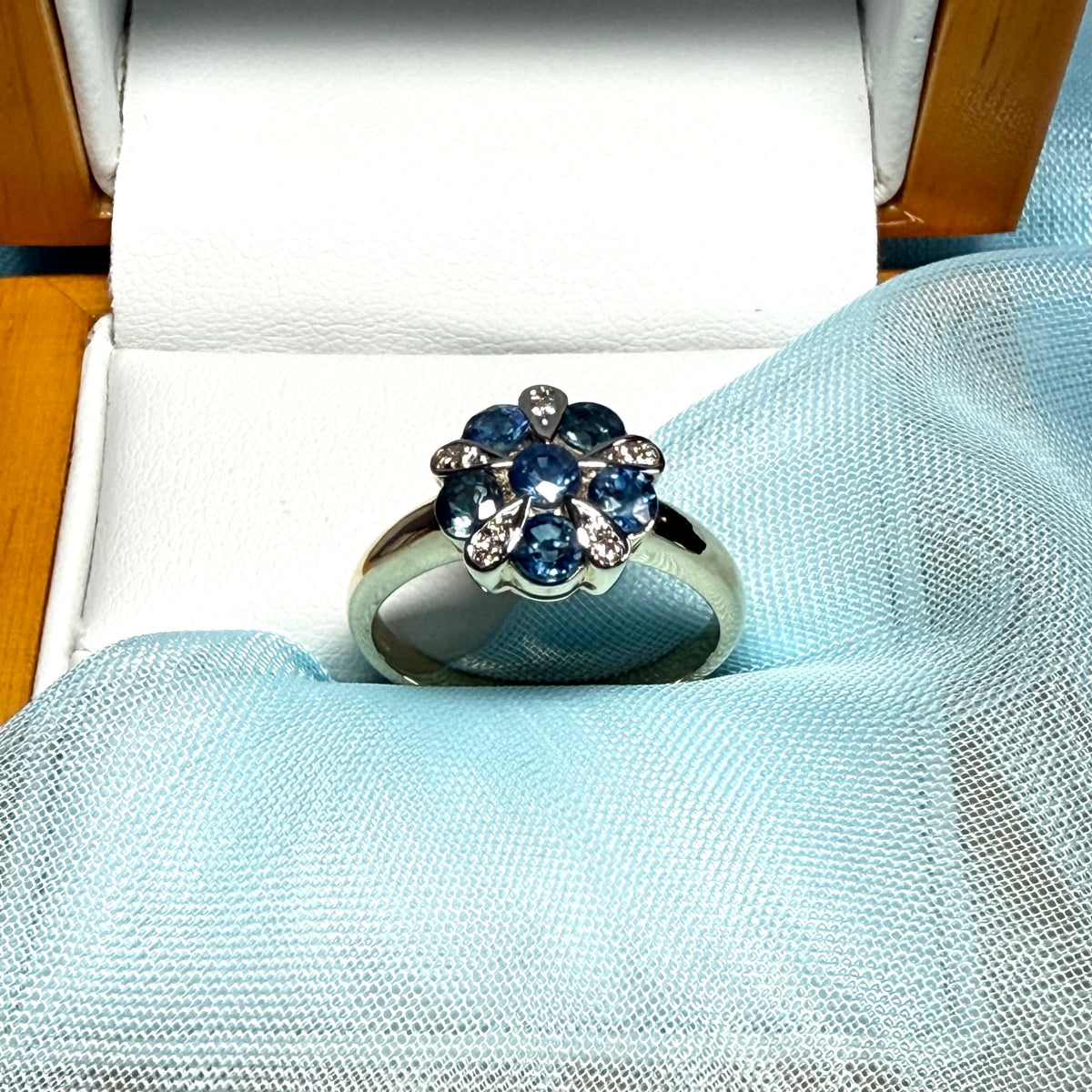Real light blue sapphire and real diamond round cluster ring yellow gold