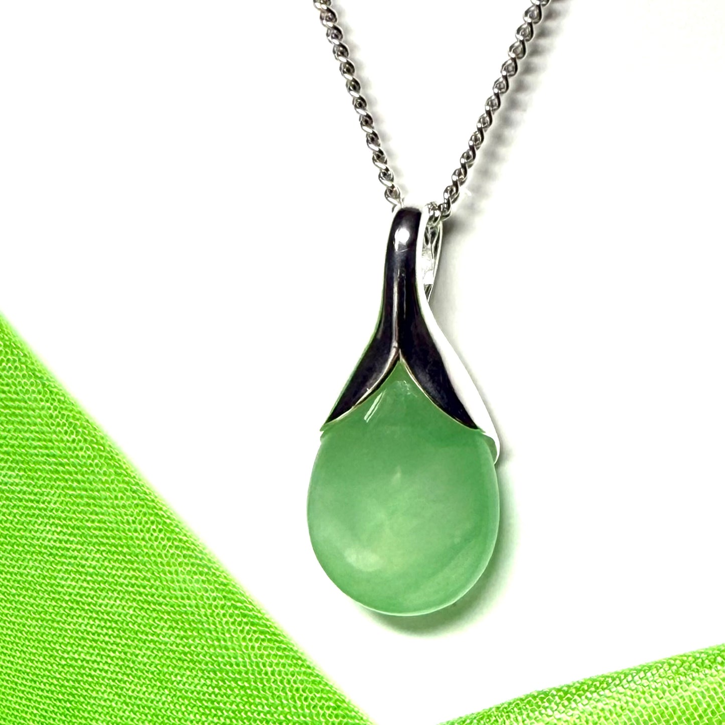 Real green jade tear drop dotted sterling silver pear shaped pendant including solid curb chain