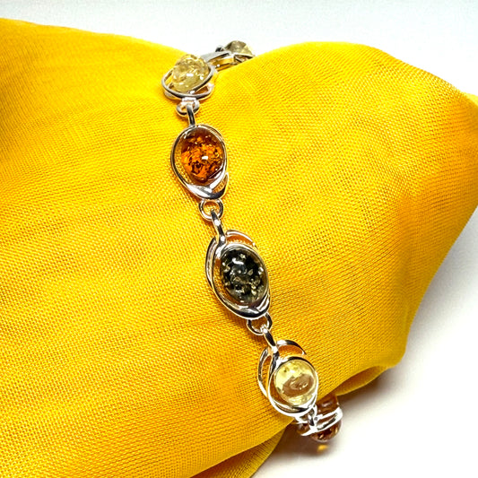 Real multicoloured amber oval shaped bracelet sterling silver