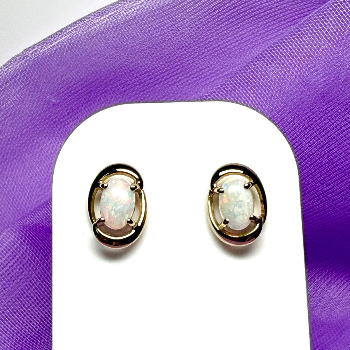 Real opal yellow gold fancy oval stud earrings