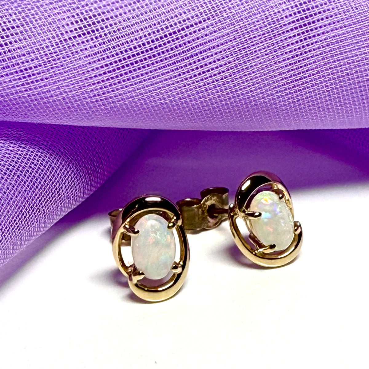 Real opal yellow gold fancy oval stud earrings