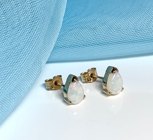 Real opal yellow gold pear shaped stud earrings