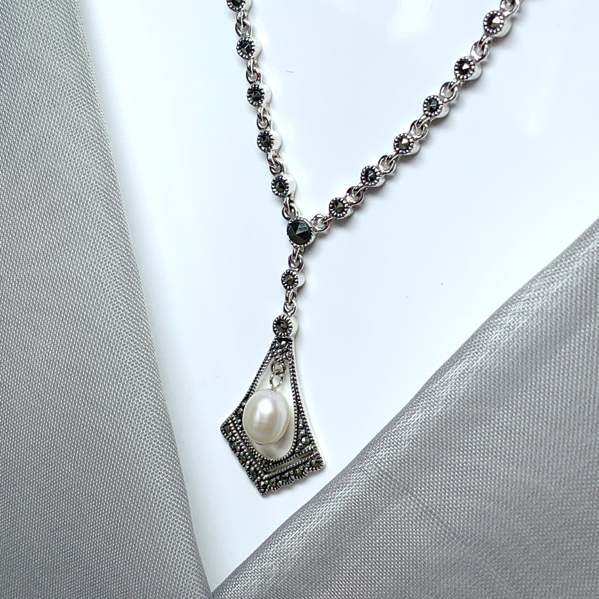 Real pearl and marcasite necklace sparkling V shaped pendant