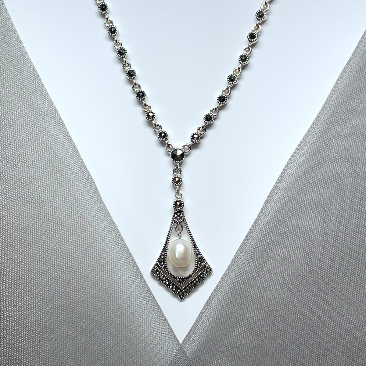 Real pearl and marcasite necklace sparkling V shaped pendant