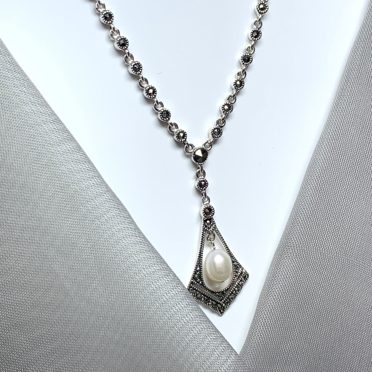 Real pearl and marcasite necklace sparkling V shaped pendant