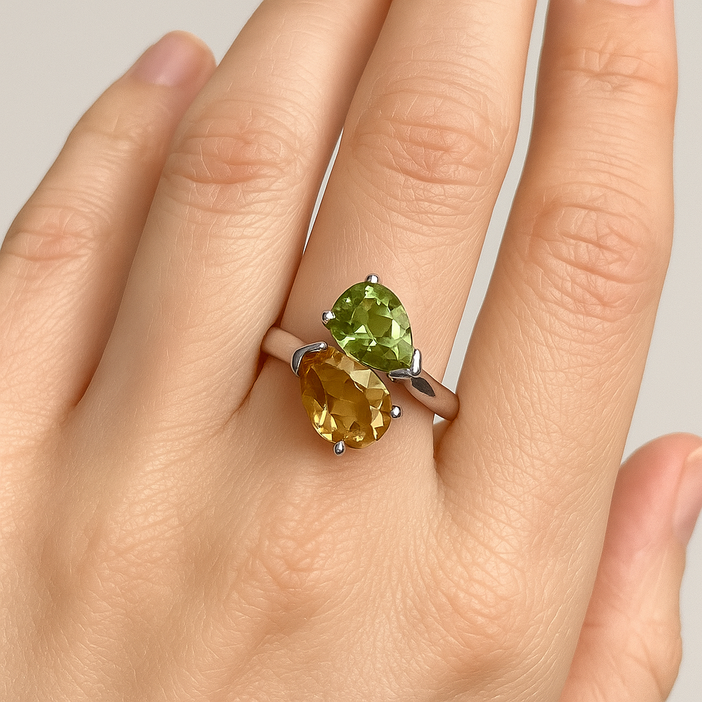 Real peridot and citrine fancy dress cocktail ring on the finger (by AI)