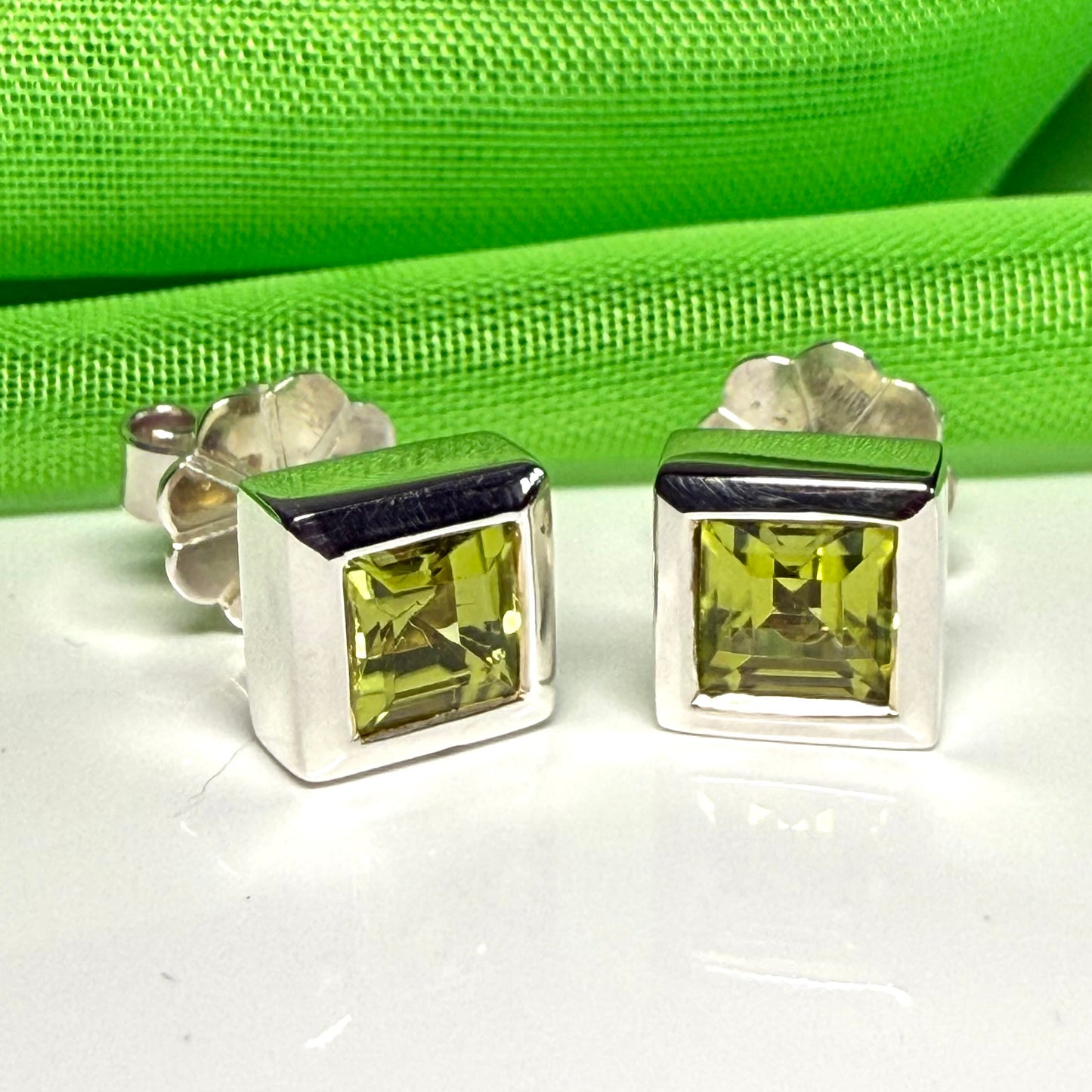 Real peridot square stud earrings rubbed over edged