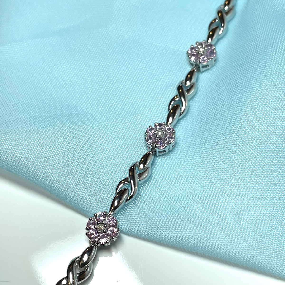 Real pink sapphire and diamond white gold daisy flower bracelet